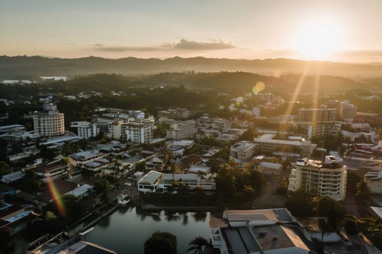 Bacolod vs. Cebu for Retirees — The Case for Negros 1 Bacolod City skyline at golden hour, Negros Island, Philippines